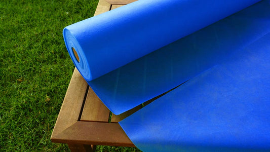 ROLLO DE MANTEL TEJIDO (TNT) PRECORTADO 1m x 50m